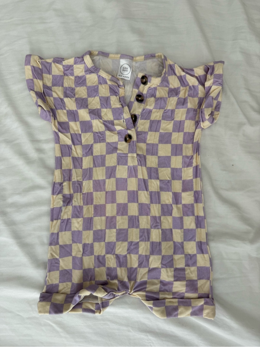 Lou Lou & Company cream and lilac romper